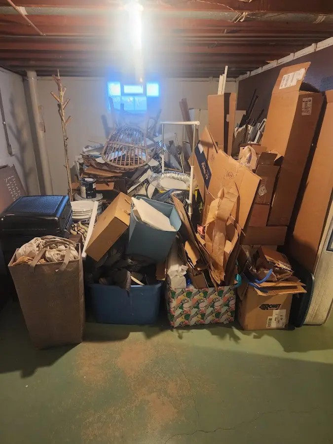 Roll-off dumpster container at job site for 4 Yard Dumpster Rental in Rhinelander